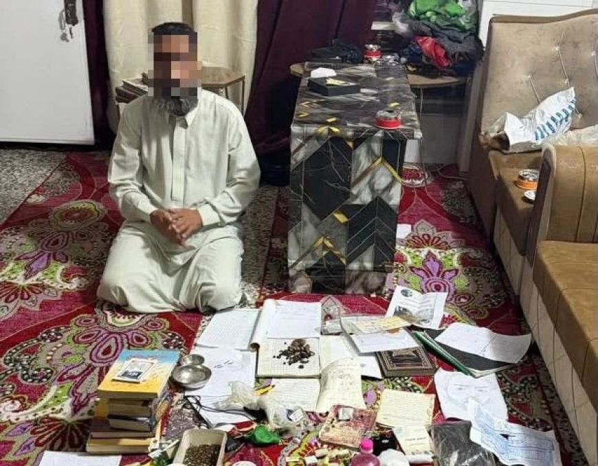 اعتقال مشعوذ مُسلح ببندقيتين في بغداد